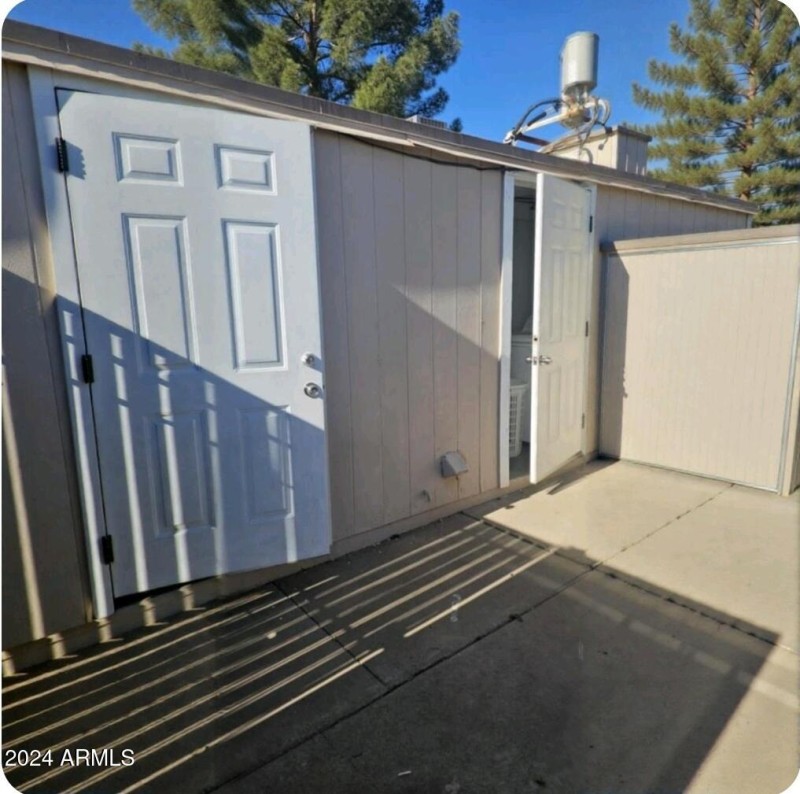 Storage / Laundry Room in backyard