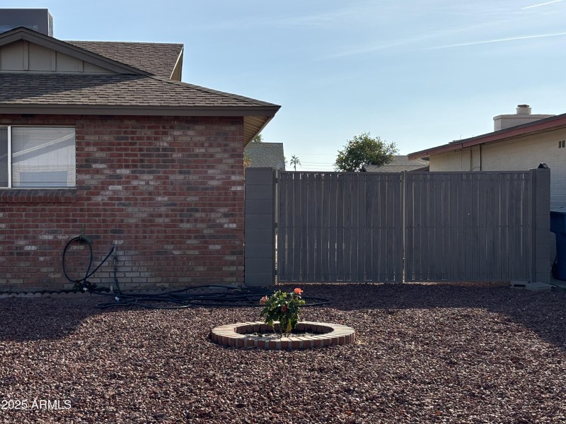 RV gate on west side of home