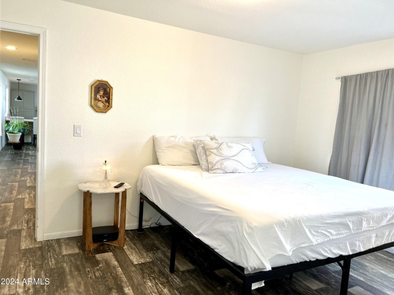 FULL VIEW OF MASTER BEDROOM TO HALLWAY