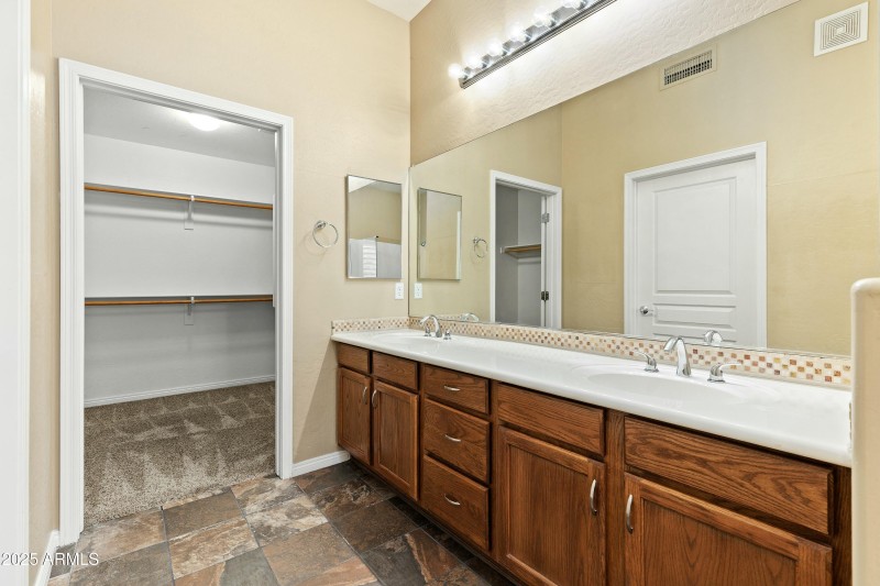 Primary Bath to Walk In Closet