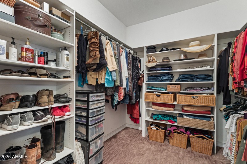 Primary walk-in closet 1 of 2