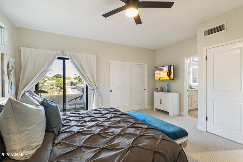 MASTER SLIDING DOORS TO OUTDOOR BALCONY