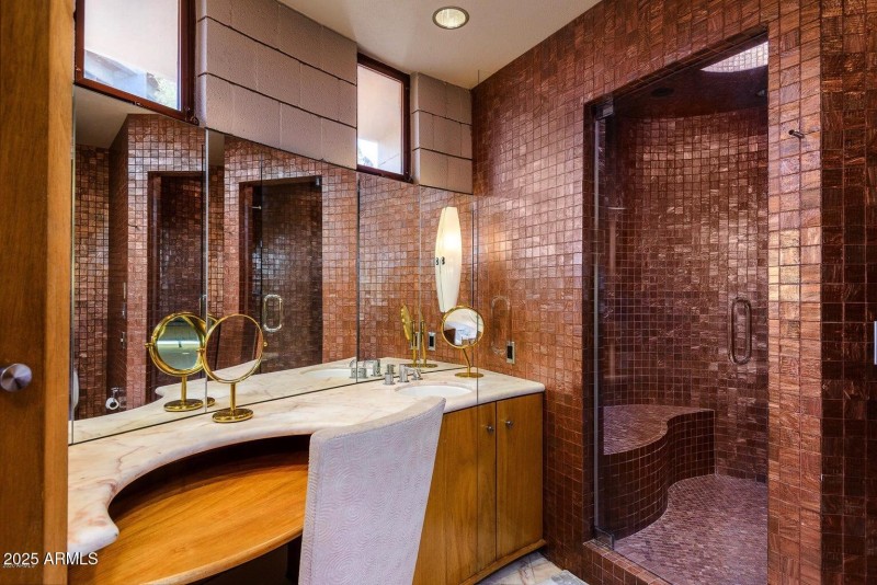 Primary shower and vanity area