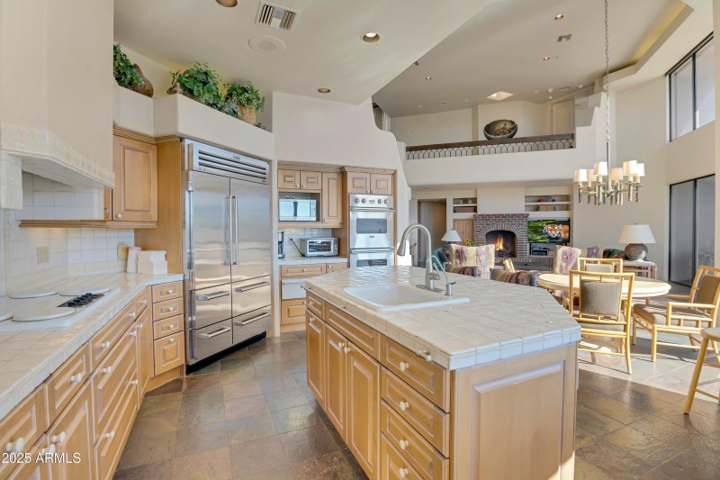 Kitchen and adjacent family room