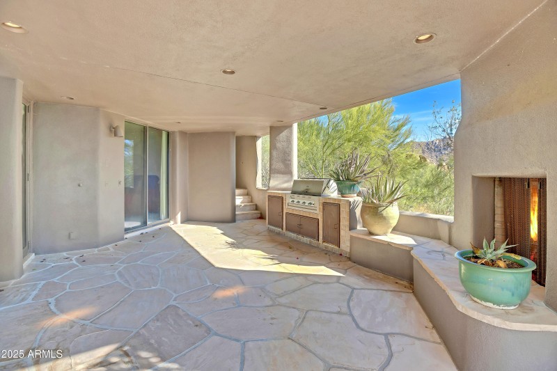 Outdoor living room with fireplace