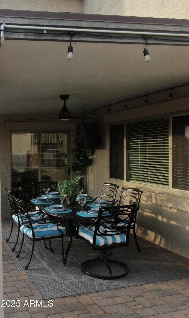 PATIO TV AND MOUNTED ELECTRIC HEATERS