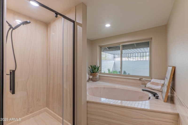 Primary walkin shower and soaking tub