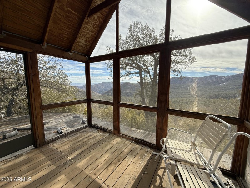 Screened in porch on guest house