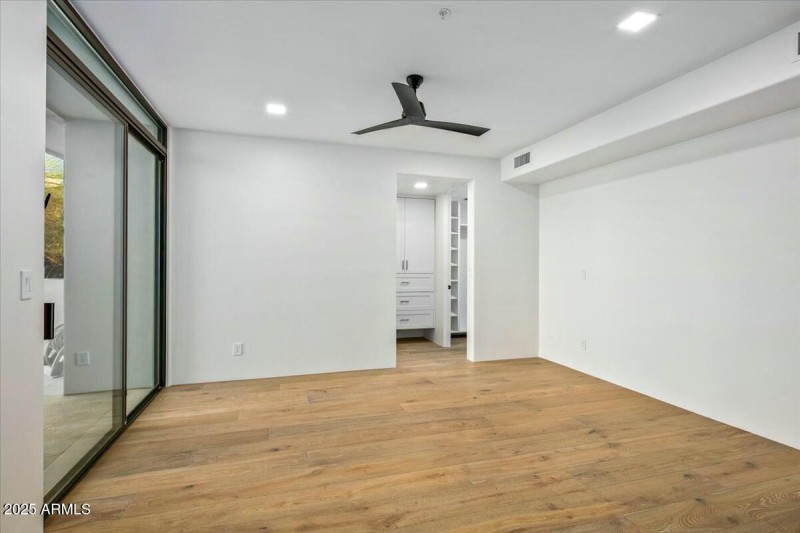 Guest Bedroom with Glass Doors to Patio