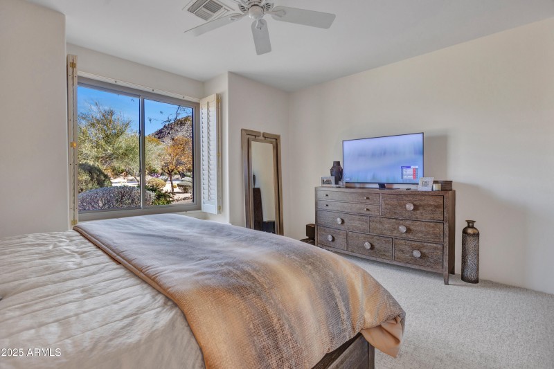 Guest bedroom with mountain views