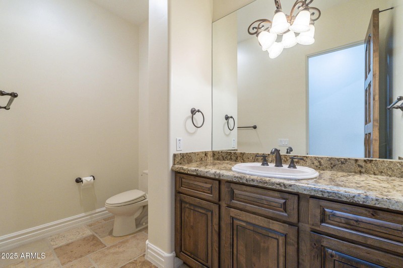 Hall bath on primary suite side