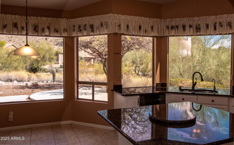 KITCHEN WITH WALL OF WINDOWS