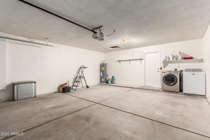 Garage With Laundry & Water Heater