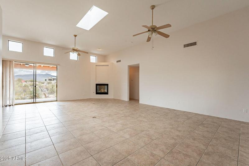 Great room looking to back sliding door