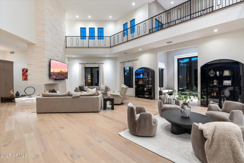 Upper level looks below to grand room