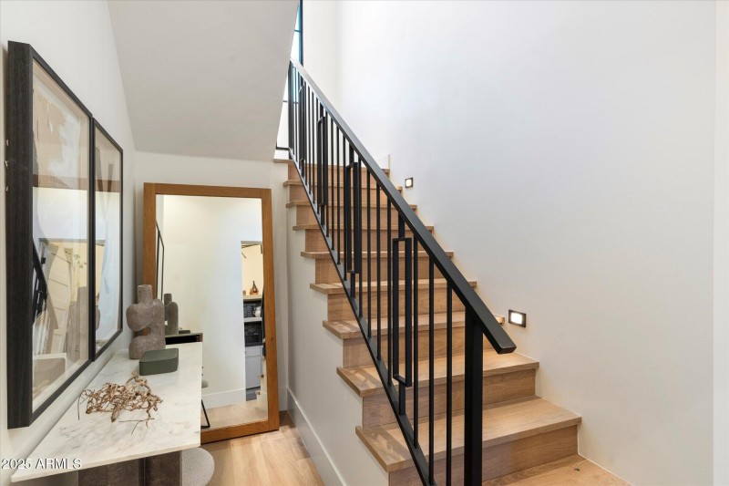 One of two stairs to upper level