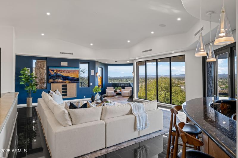 Entertain from the bar to fireplace