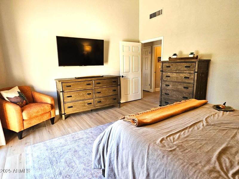 Primary Bedroom w/ Flat Screen TV