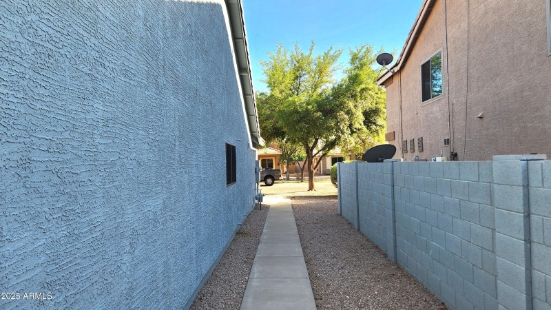 Walkway down side of home