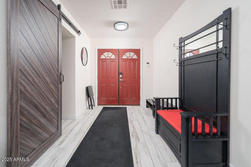 Entry, office with additional bed to the