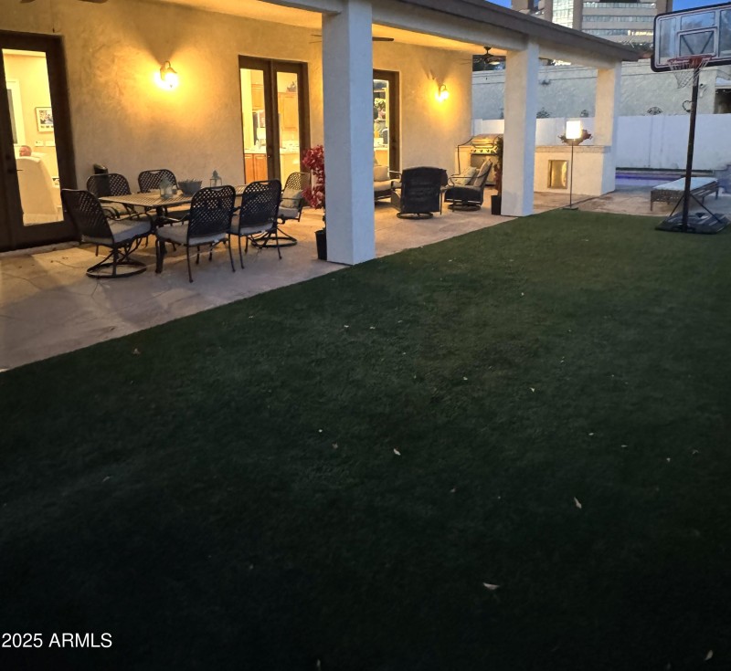 sizeable covered patio and built in gril