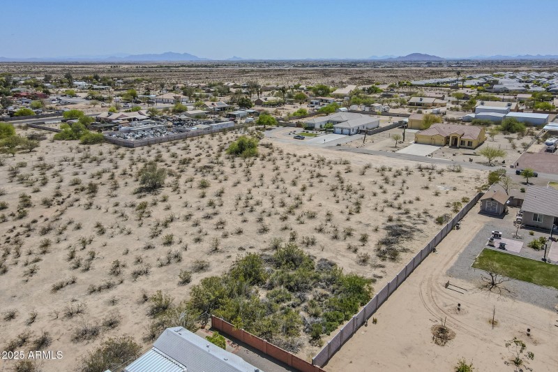 Nestled among other custom homes.