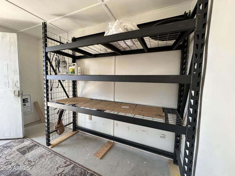 Shed interior wth shelving (2)