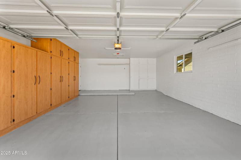 garage with cabinets
