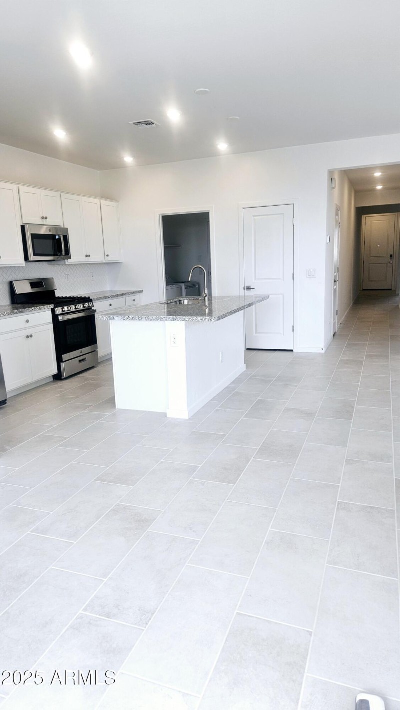 Frontera Lot 143 Kitchen with Washer Dry