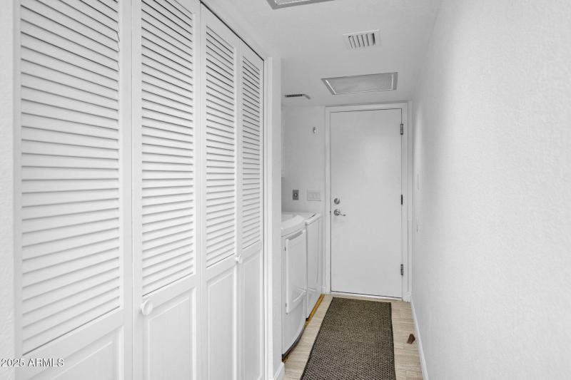 laundry and storage from garage entry