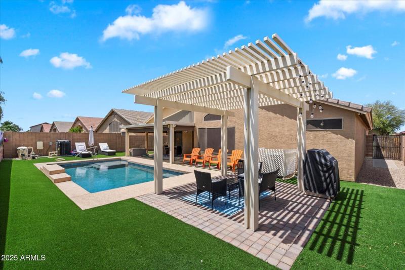 Vast Backyard with Seating Area