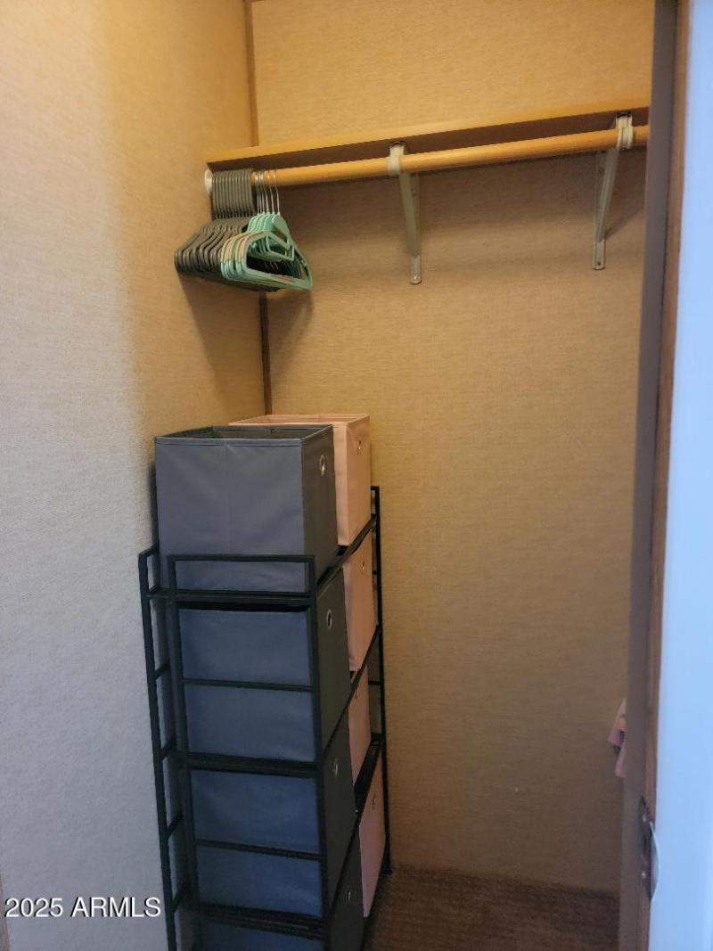 808 closet in guest bedroom