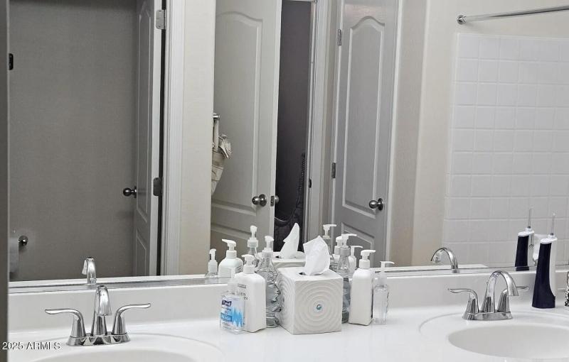 Dual sinks in both full bathrooms.