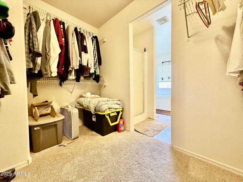 Upstairs Primary Suite Walk-In Closet