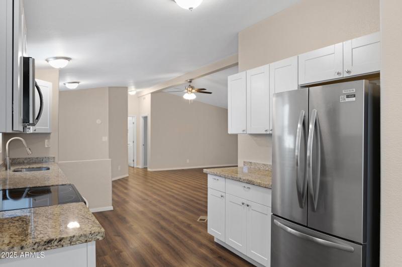 KITCHEN, PRIMAY DINING & LIVING ROOM