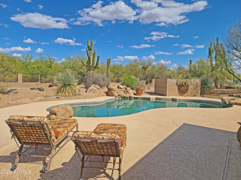 Pool view w rock waterfall