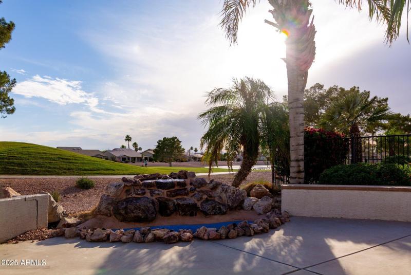 Fountain with view of golf course