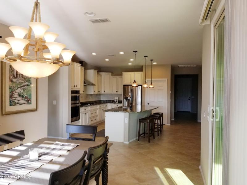 Utopia kitchen ad dining area