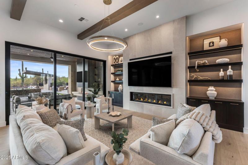 Living room open to kitchen and dining