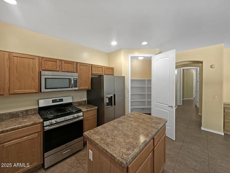 Kitchen island and walk in pantry