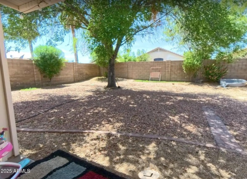 Shady backyard for family fun.