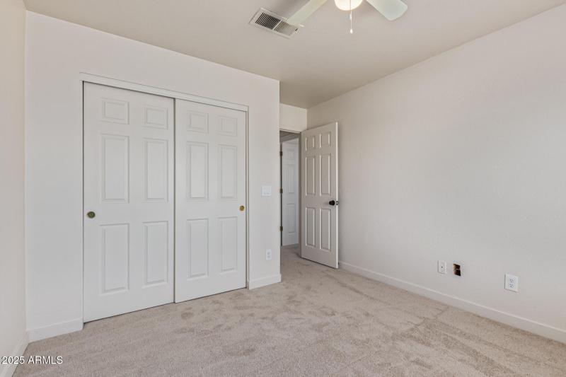 bedroom with new carpet