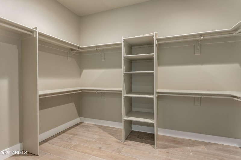 Master bed custom walk in closet