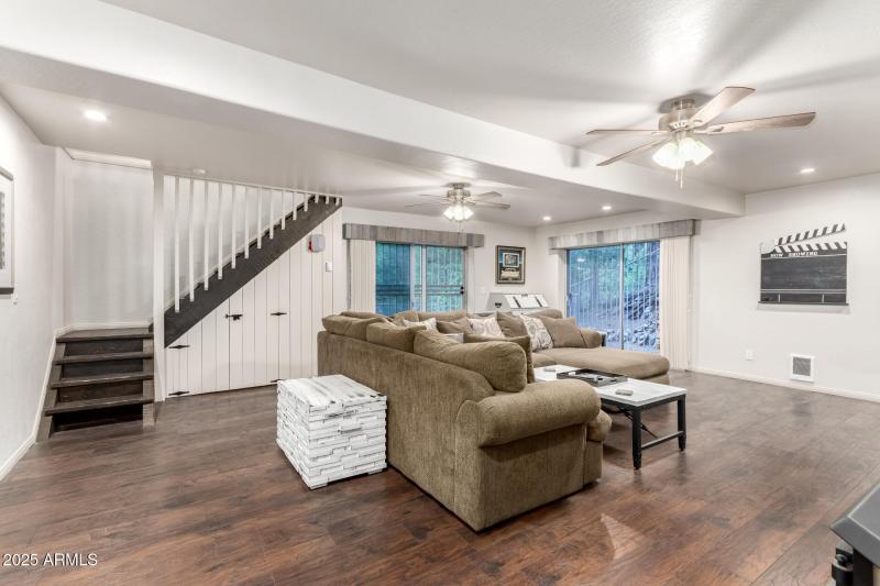 Living room leads to upstairs