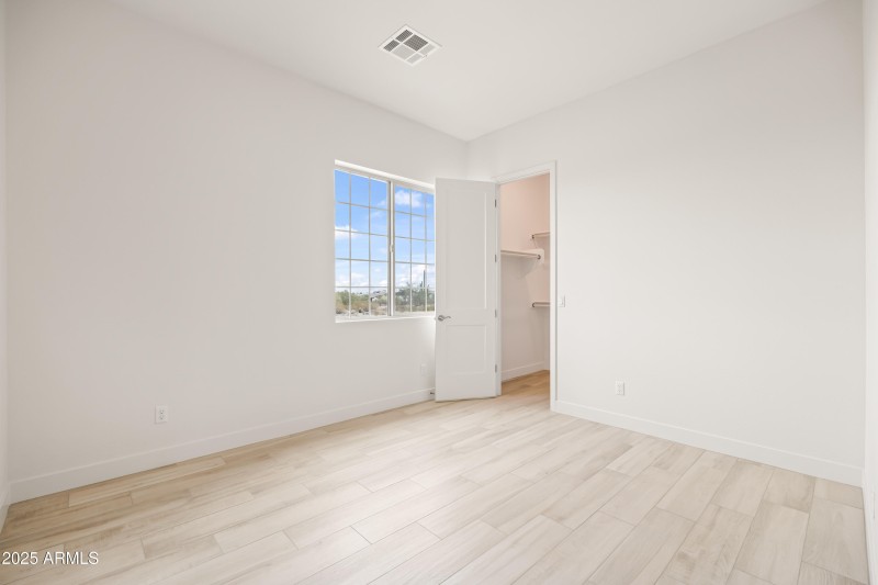 Secondary Bedroom's Walk-in Closet