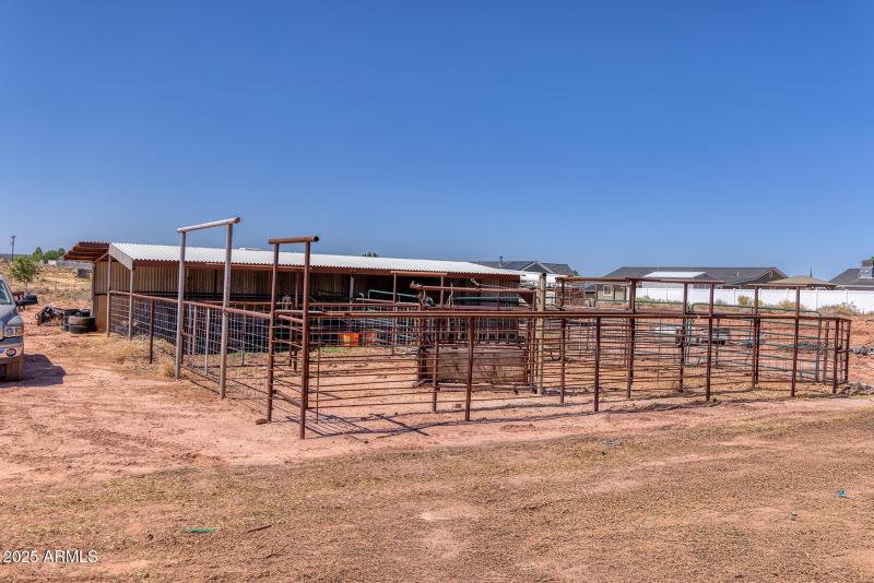 corrals with covered hay area