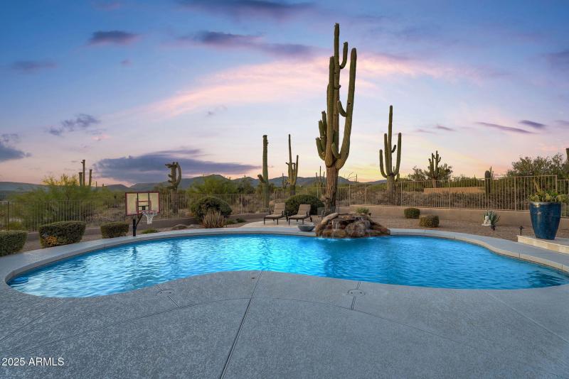 Large heated pool w/ waterfall