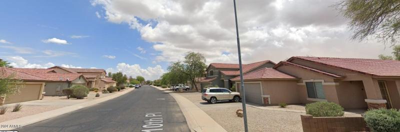 Street view west of house, looking East