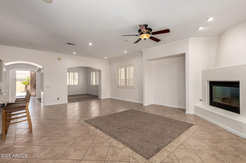 Great Room - tall ceilings and shutters.
