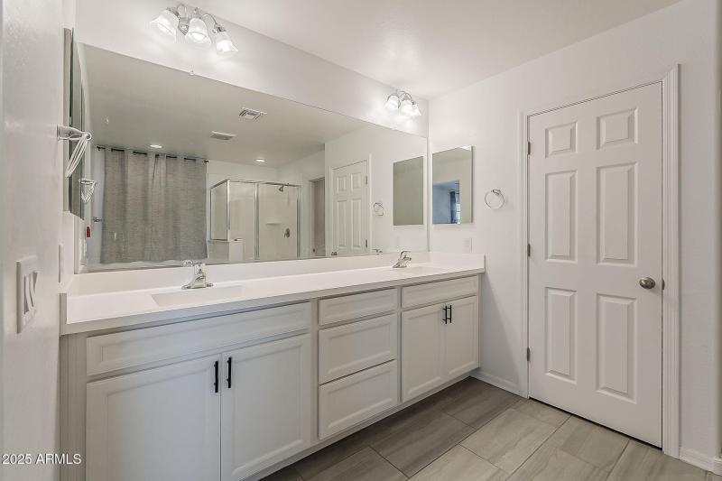 Dual Sinks & White Cabinetry